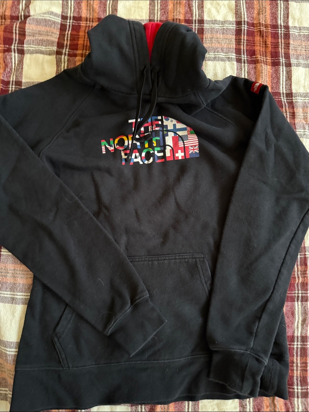 The North Face Black Pullover Hoodie with Multicolor Flag Logo